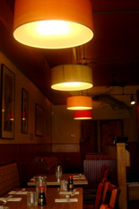 Chinoise amber pendants over sushi counter